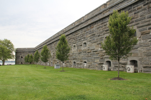 Outside of a stone building with trees